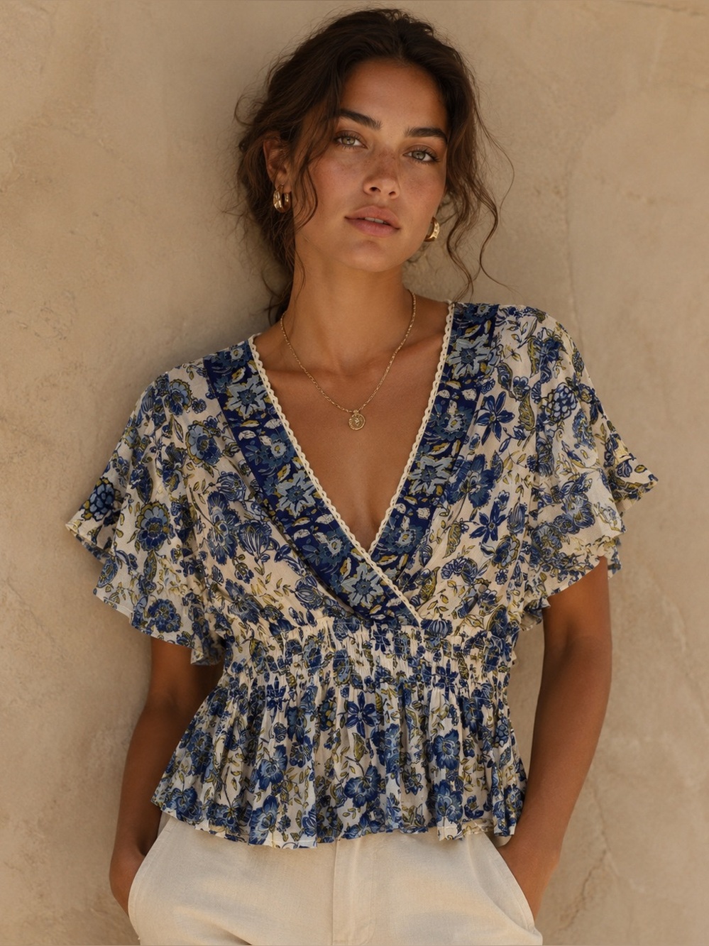 Blue Floral Smocked Boho Peplum Top
Anthro- Inspired Cottagecore Flutter Sleeve